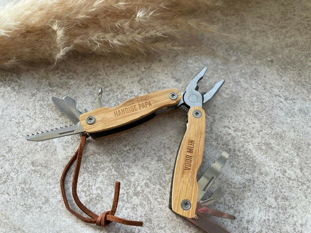 Gegraveerde houten multitool