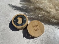 Gegraveerde flesopener met meetlint