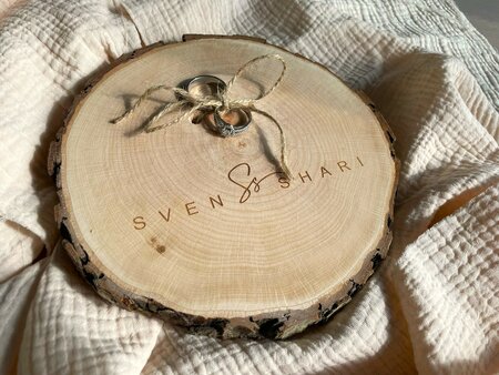 Gegraveerde houten ringenschijf