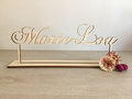 Houten naam op voet gepersonaliseerd